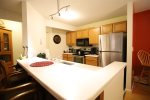Fully equipped kitchen in Deer Park Resort at Lincoln, NH